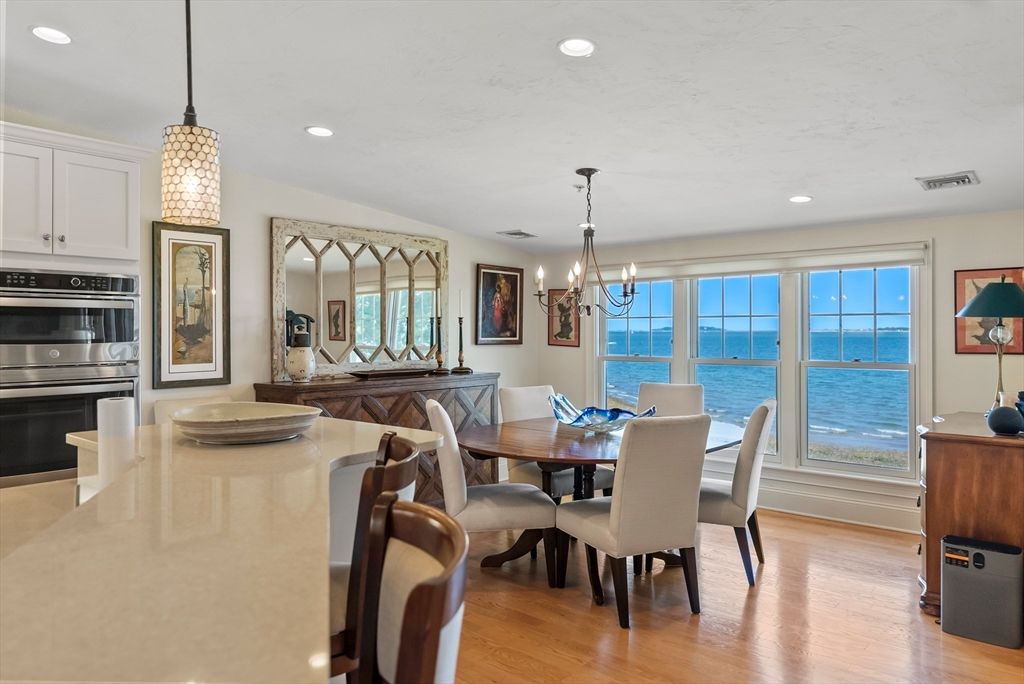 Chandelier, Dining room, Interior, Pendant Lights, Recessed Lighting, Stainless Steel Appliances, Water, Wood Texture Flooring
