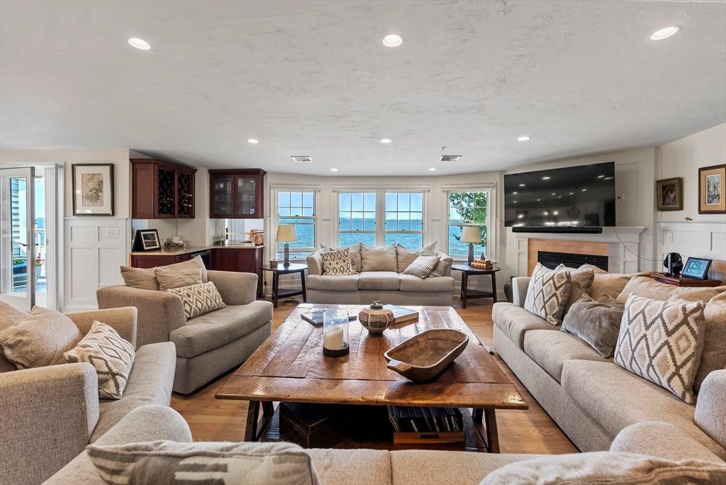 Fireplace, Interior, Living room, Recessed Lighting, Water, Wood Texture Flooring