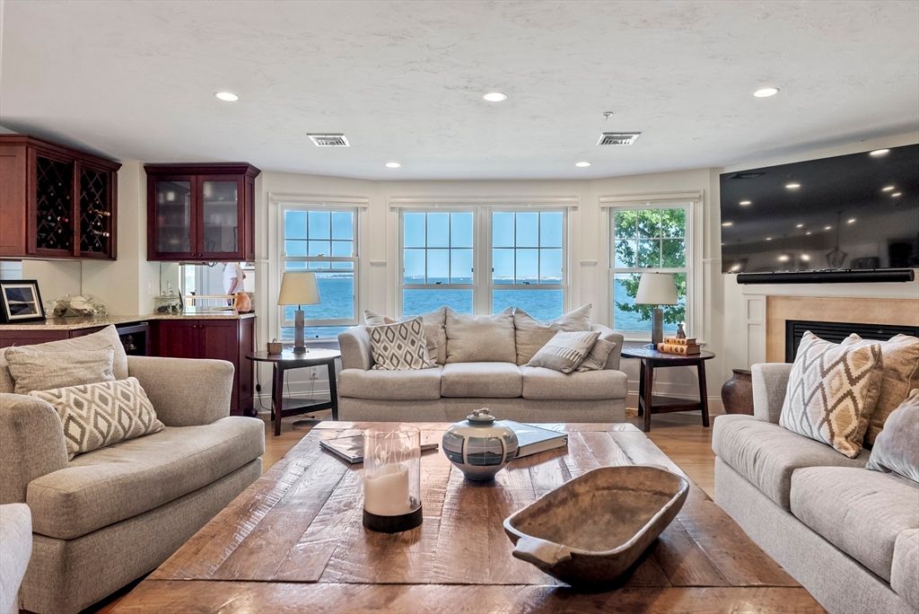 Fireplace, Interior, Living room, Recessed Lighting, Water, Wood Texture Flooring