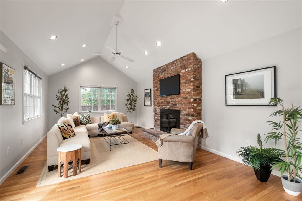 Fireplace, Interior, Living room, Recessed Lighting, Stone Walls, Wood Texture Flooring