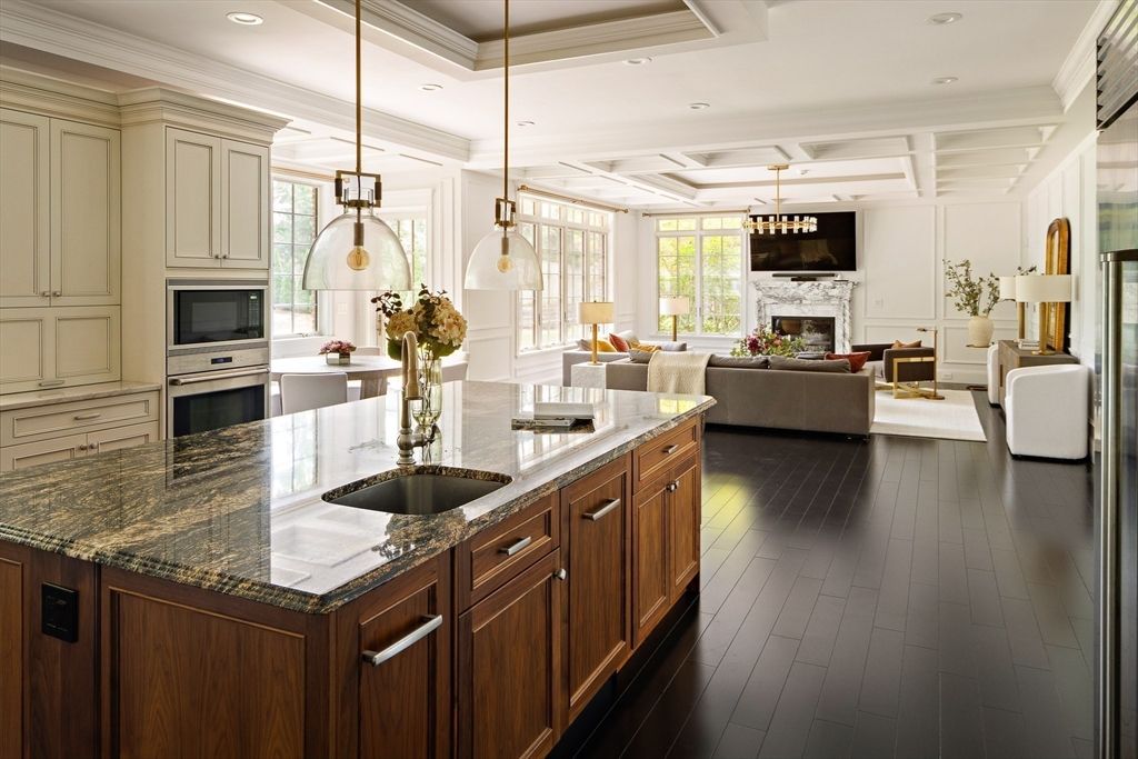 Fireplace, Interior, Kitchen, Living room, Pendant Lights, Recessed Lighting, Stainless Steel Appliances, Wood Texture Flooring