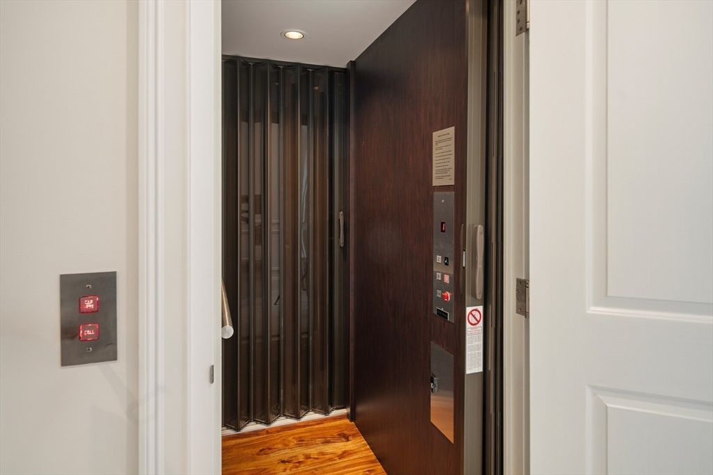 Elevator, Interior, Recessed Lighting, Wood Texture Flooring, Wooden Walls