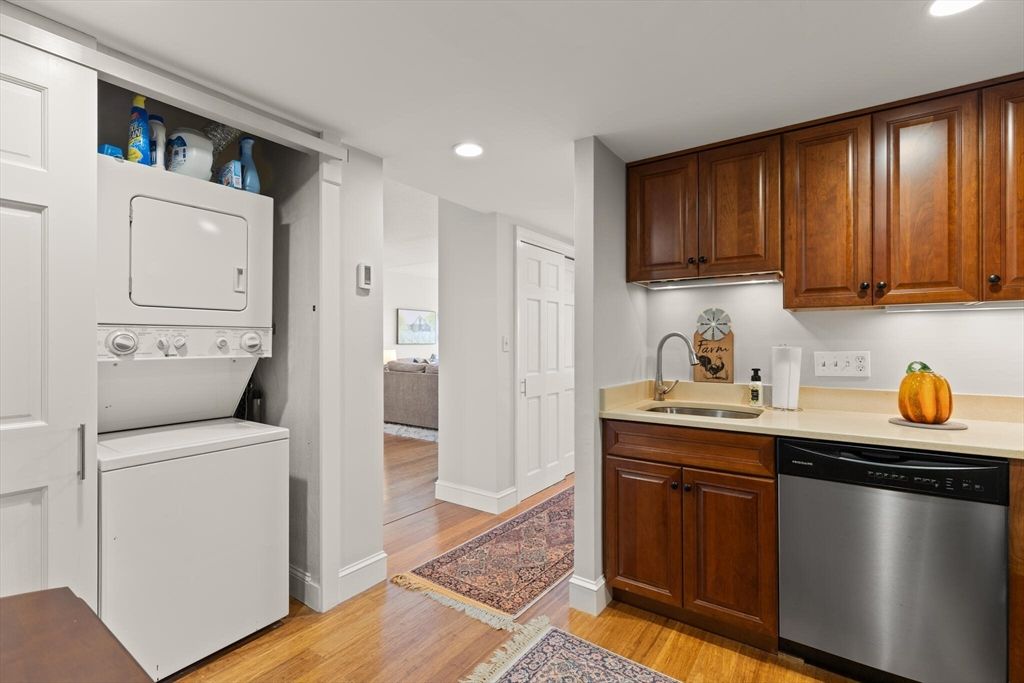 Interior, Kitchen, Recessed Lighting, Washer, Wood Texture Flooring
