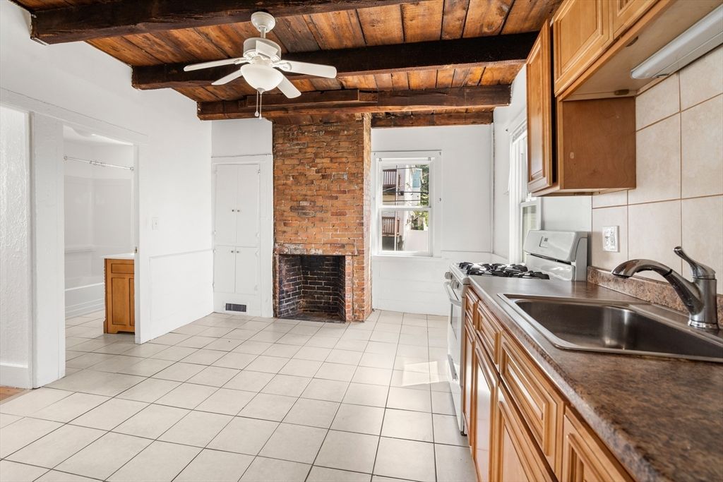 Empty room, Fireplace, Interior, Kitchen, Stone Walls, Wooden Beams, Wooden Ceilings