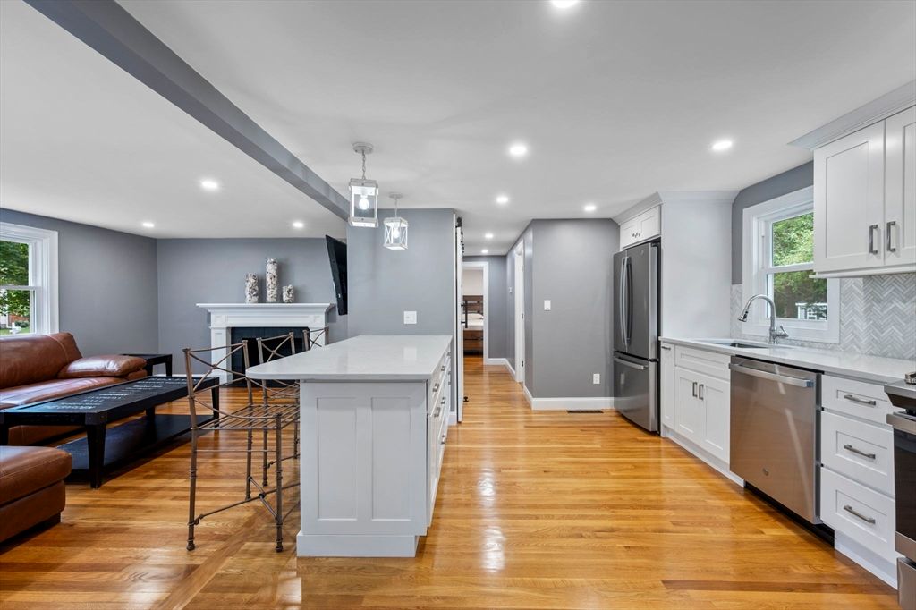 Fireplace, Interior, Kitchen, Pendant Lights, Recessed Lighting, Stainless Steel Appliances, Wood Texture Flooring
