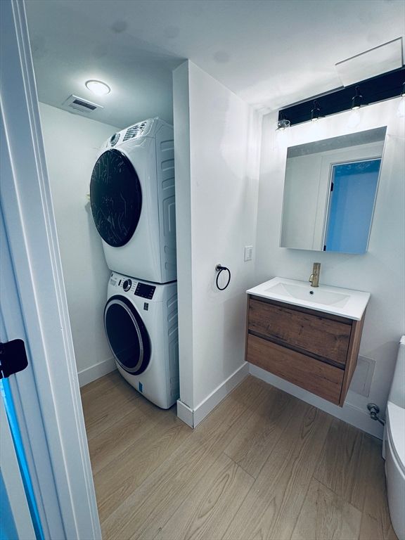 Bathroom, Interior, Recessed Lighting, Utility Closets, Washer, Wood Texture Flooring