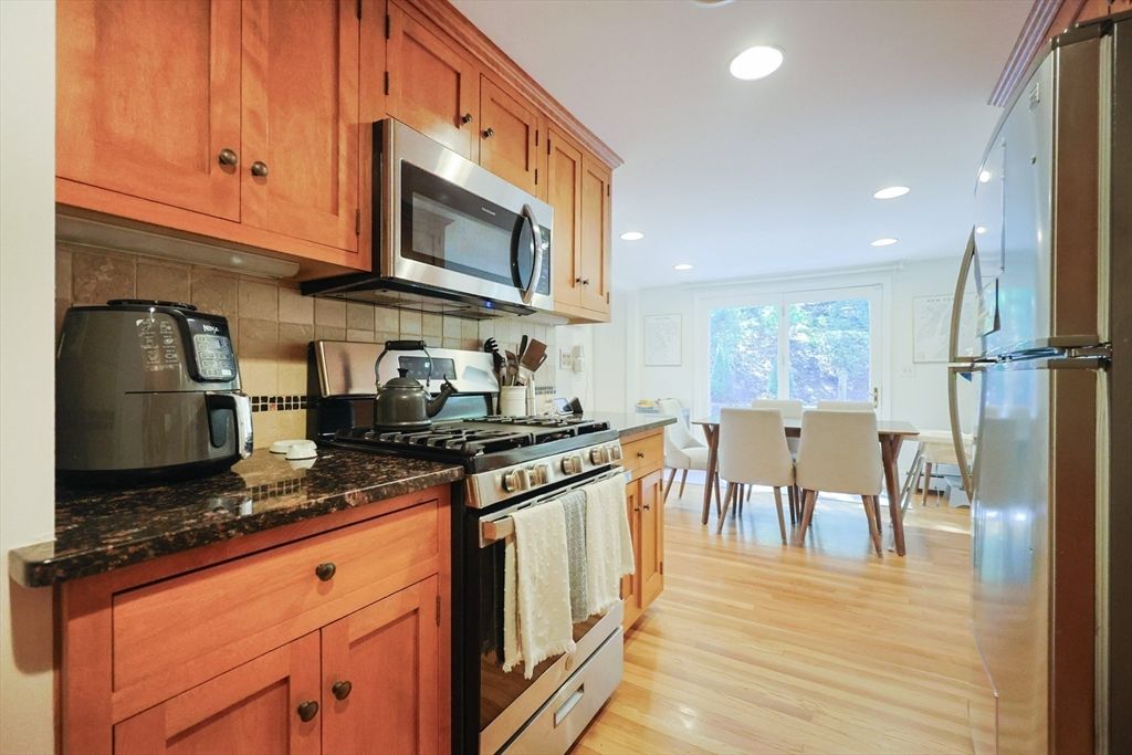Dining room, Interior, Kitchen, Recessed Lighting, Stainless Steel Appliances, Wood Texture Flooring
