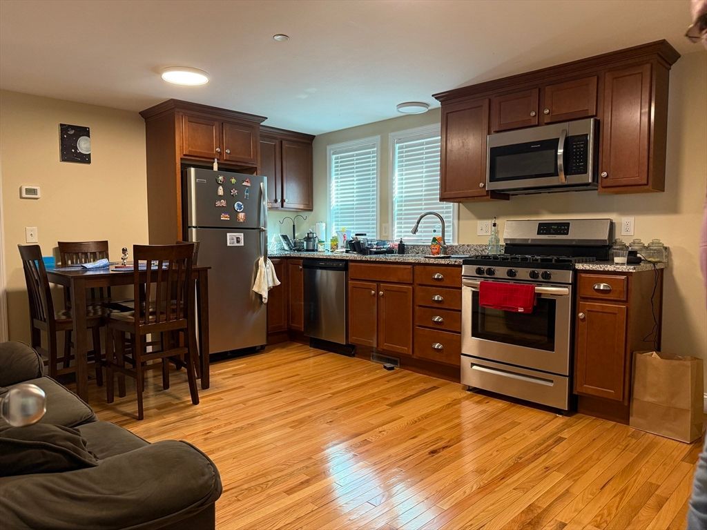 Dining room, Interior, Kitchen, Recessed Lighting, Stainless Steel Appliances, Wood Texture Flooring