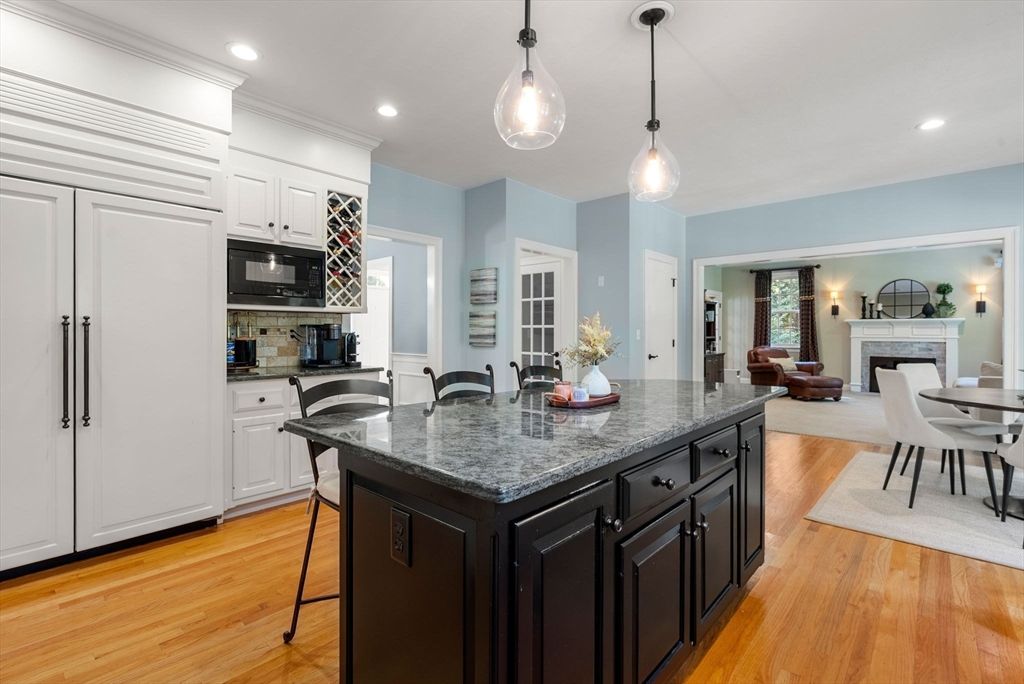 Dining room, Fireplace, Interior, Kitchen, Pendant Lights, Recessed Lighting, Wood Texture Flooring
