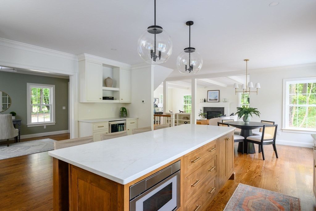 Dining room, Fireplace, Interior, Kitchen, Pendant Lights, Wood Texture Flooring