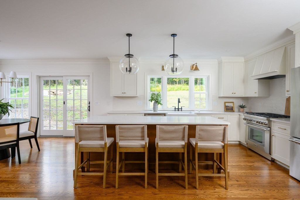 Dining room, Interior, Kitchen, Pendant Lights, Stainless Steel Appliances, Wood Texture Flooring