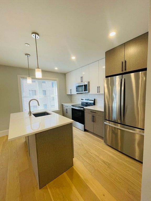 Interior, Kitchen, Pendant Lights, Recessed Lighting, Stainless Steel Appliances, Wood Texture Flooring