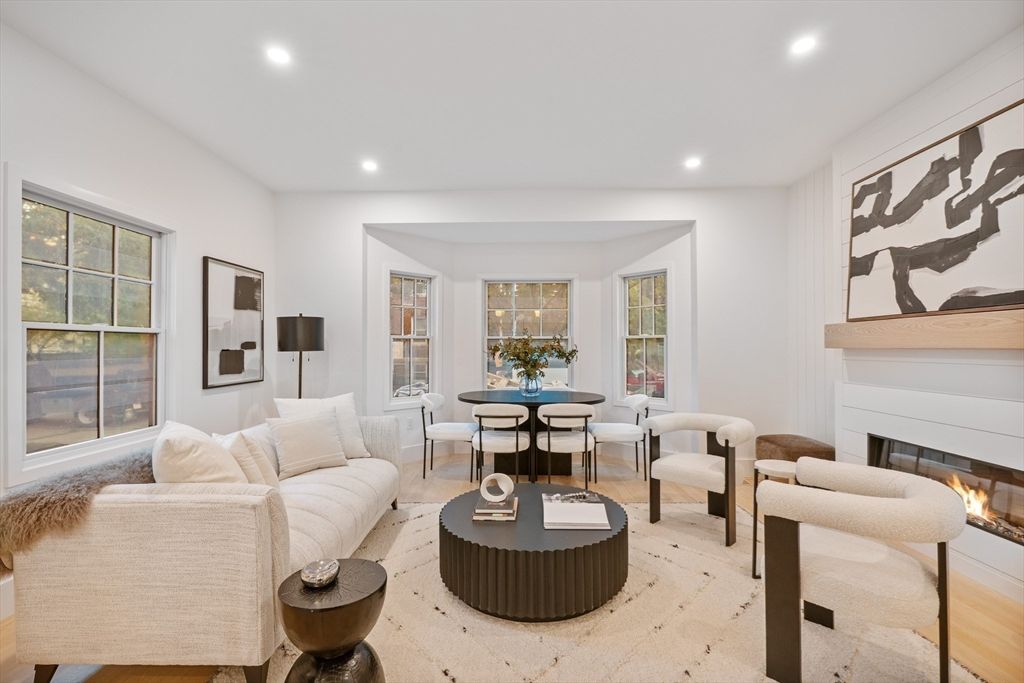 Dining room, Fireplace, Interior, Living room, Recessed Lighting, Wood Texture Flooring
