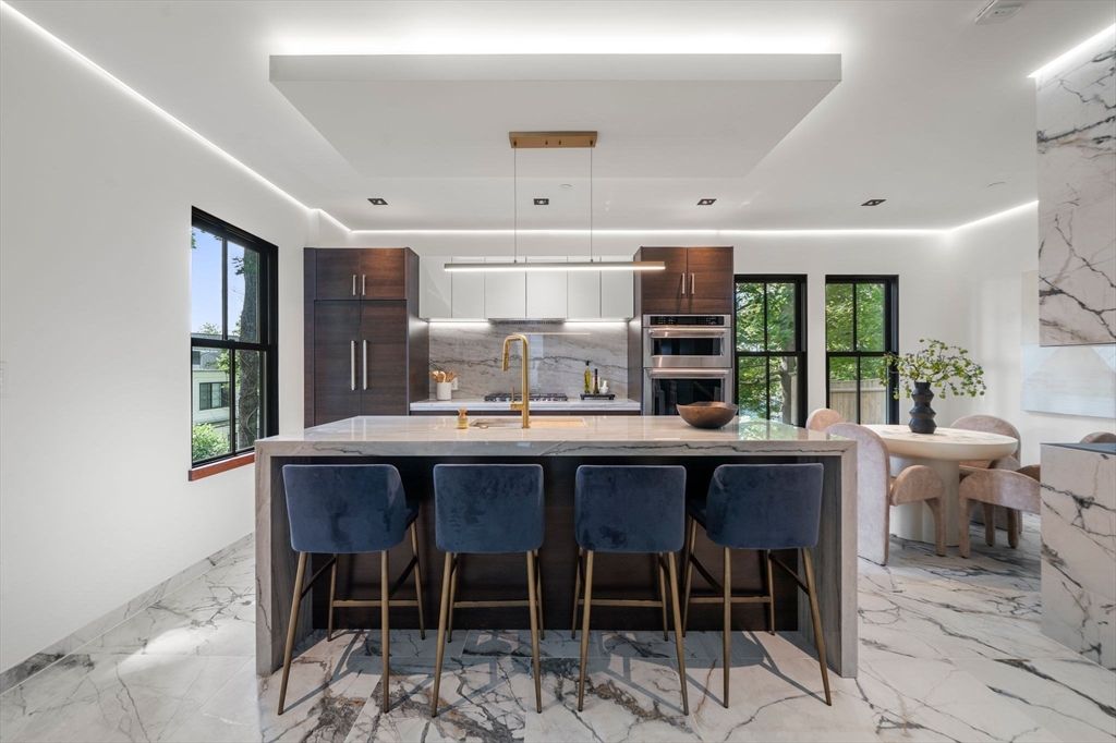 Dining room, Interior, Kitchen, Marble, Marble Walls, Pendant Lights, Recessed Lighting, Stainless Steel Appliances