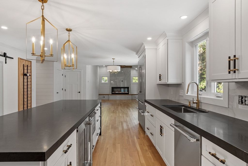 Chandelier, Fireplace, Interior, Kitchen, Pendant Lights, Recessed Lighting, Wood Texture Flooring