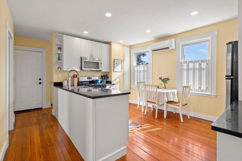 Dining room, Interior, Kitchen, Recessed Lighting, Stainless Steel Appliances, Wood Texture Flooring