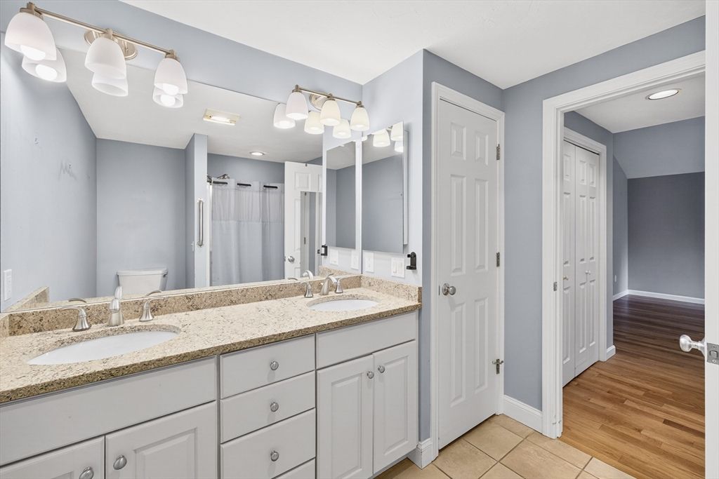 Bathroom, Dual Sink Vanities, Interior, Recessed Lighting, Wood Texture Flooring