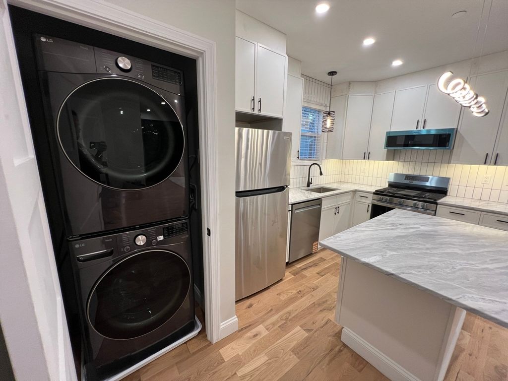 Interior, Kitchen, Pendant Lights, Recessed Lighting, Stainless Steel Appliances, Washer, Wood Texture Flooring