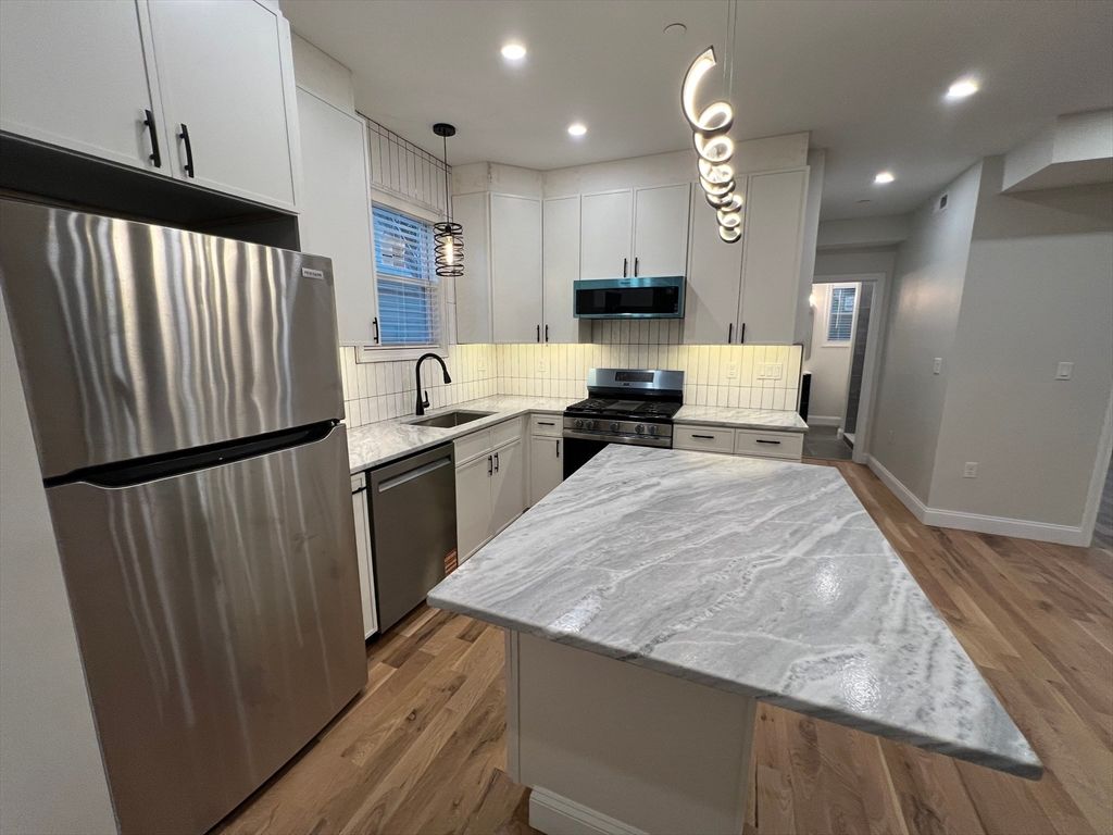 Interior, Kitchen, Pendant Lights, Recessed Lighting, Stainless Steel Appliances, Wood Texture Flooring