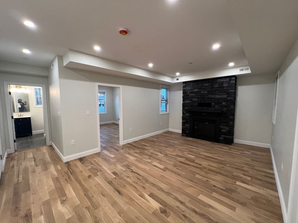Empty room, Fireplace, Interior, Recessed Lighting, Wood Texture Flooring