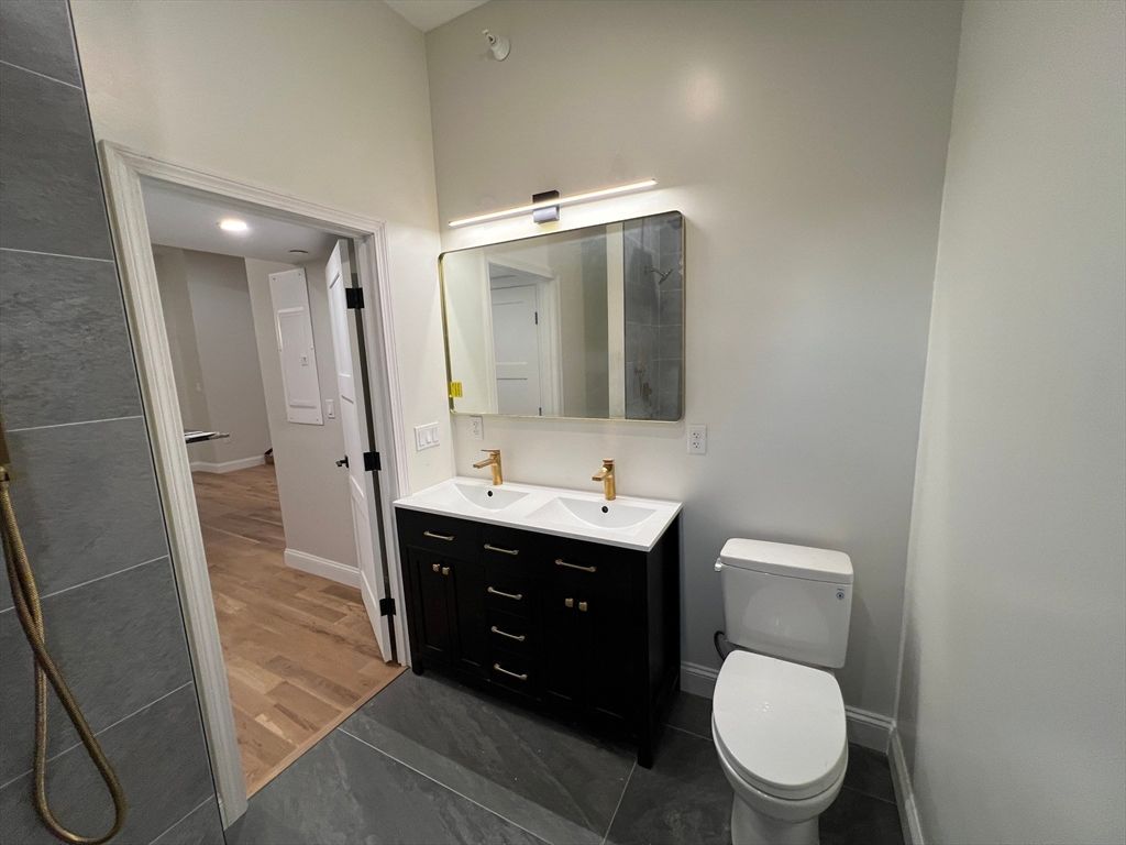Bathroom, Dual Sink Vanities, Interior, Recessed Lighting, Wood Texture Flooring