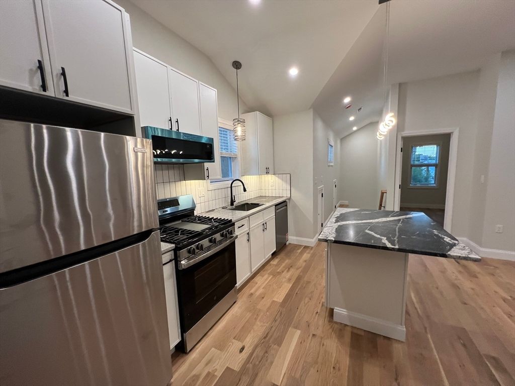 Interior, Kitchen, Pendant Lights, Recessed Lighting, Stainless Steel Appliances, Wood Texture Flooring