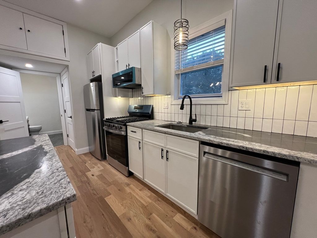 Interior, Kitchen, Pendant Lights, Recessed Lighting, Stainless Steel Appliances, Wood Texture Flooring