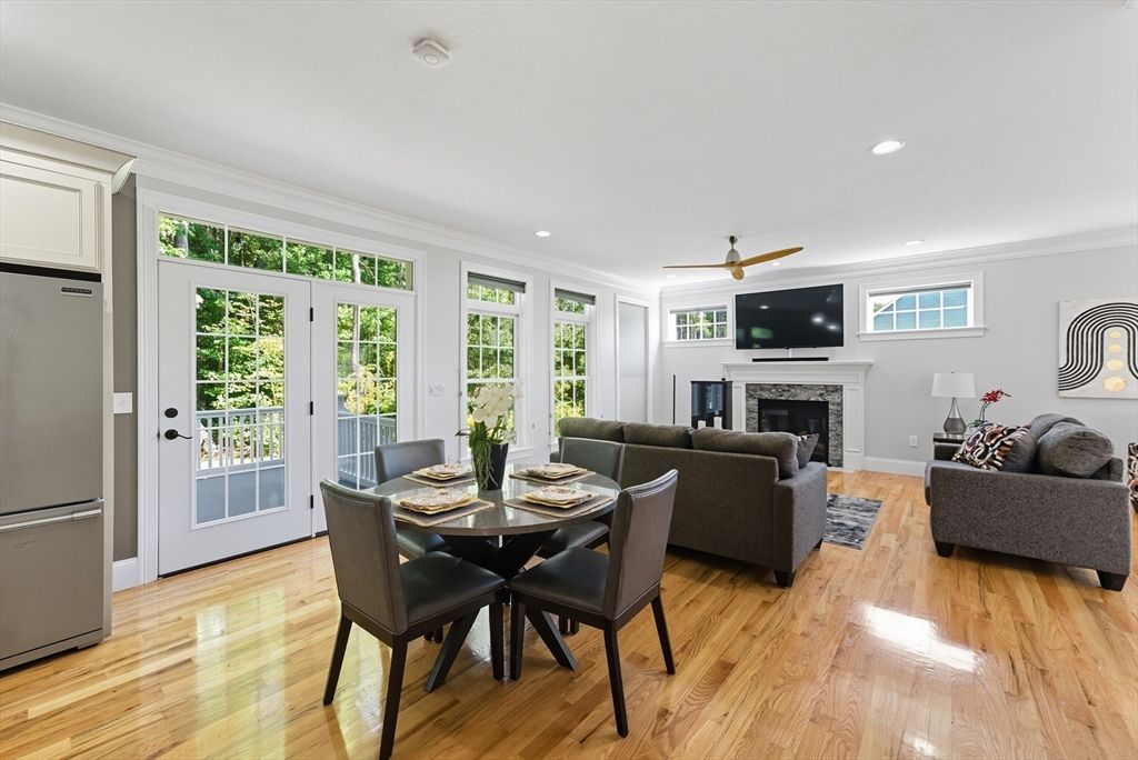 Dining room, Fireplace, Interior, Living room, Recessed Lighting, Wood Texture Flooring