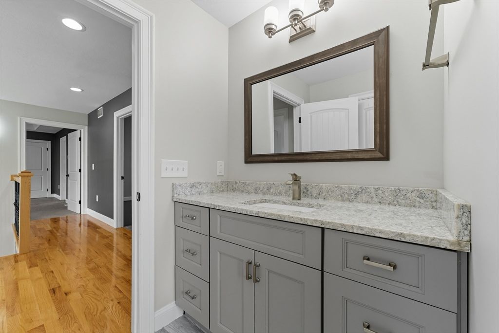 Bathroom, Dual Sink Vanities, Interior, Recessed Lighting, Wood Texture Flooring