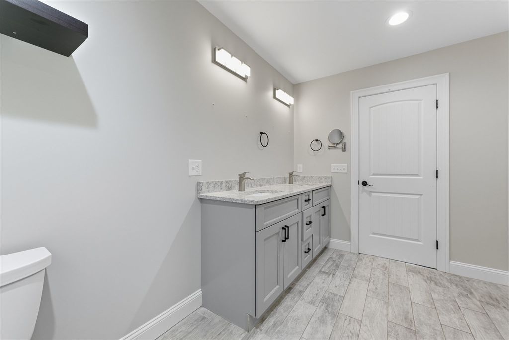 Bathroom, Dual Sink Vanities, Interior, Recessed Lighting, Wood Texture Flooring