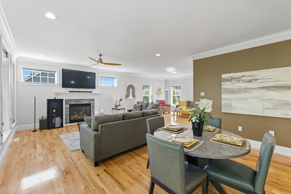 Dining room, Fireplace, Interior, Living room, Recessed Lighting, Wood Texture Flooring