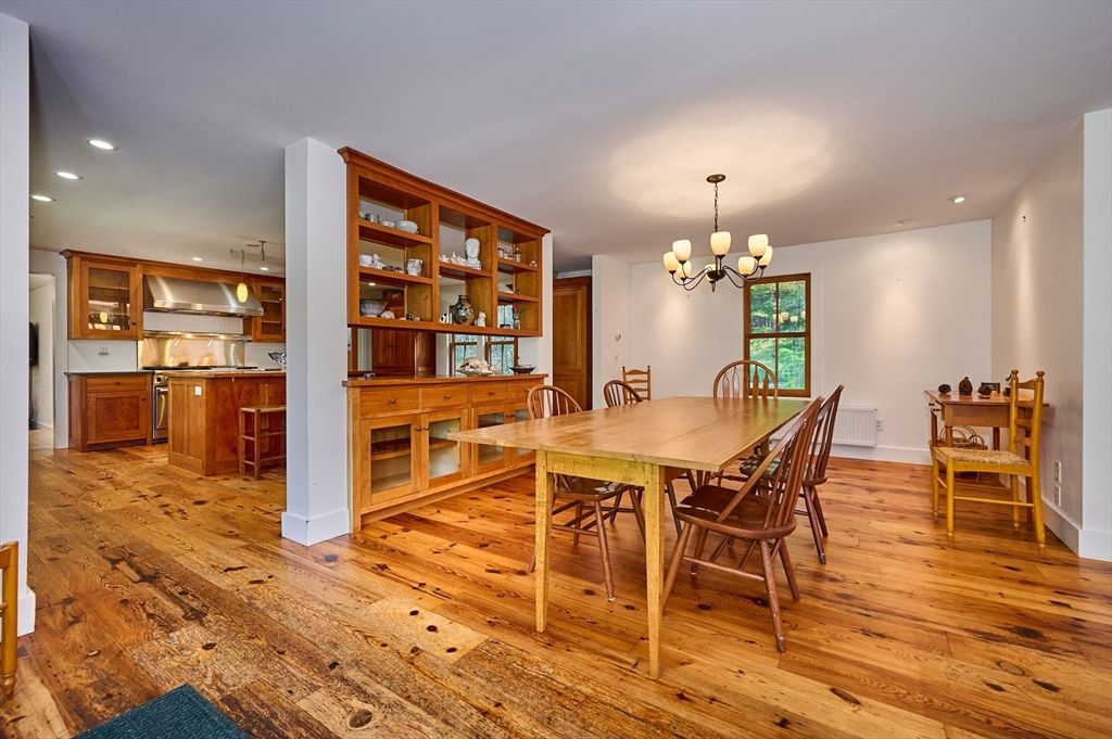 Chandelier, Dining room, Interior, Kitchen, Recessed Lighting, Stainless Steel Appliances, Wood Texture Flooring