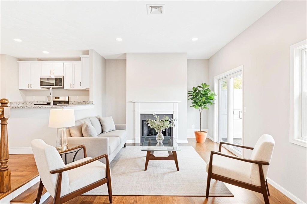 Fireplace, Interior, Kitchen, Living room, Recessed Lighting, Stainless Steel Appliances, Wood Texture Flooring