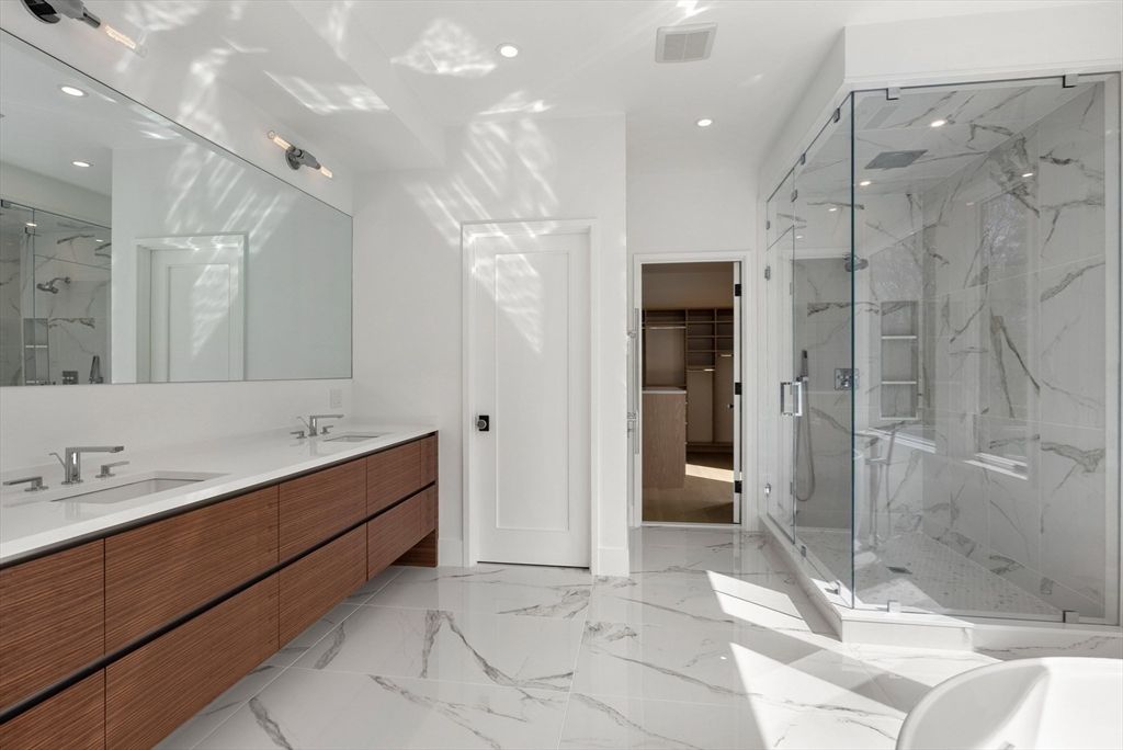 Bathroom, Dual Sink Vanities, Glass Shower, Interior, Marble, Marble Walls, Recessed Lighting