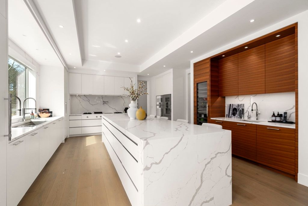 Interior, Kitchen, Marble Walls, Recessed Lighting, Stainless Steel Appliances, Wood Texture Flooring