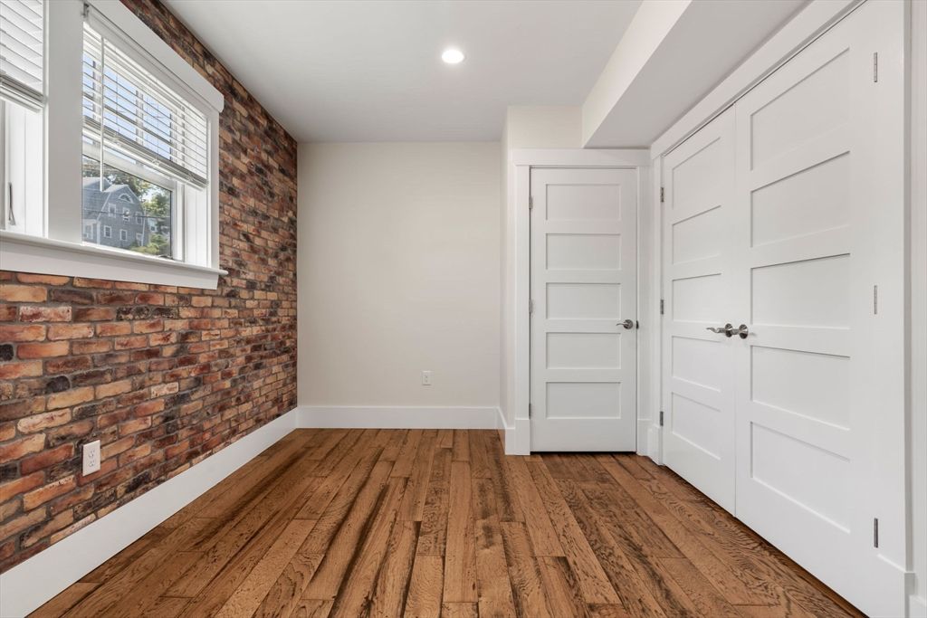 Empty room, Interior, Recessed Lighting, Stone Walls, Wood Texture Flooring