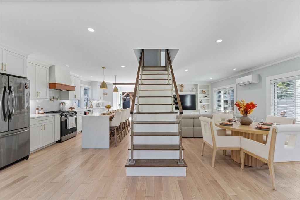 Dining room, Interior, Kitchen, Pendant Lights, Recessed Lighting, Stainless Steel Appliances, Wood Texture Flooring