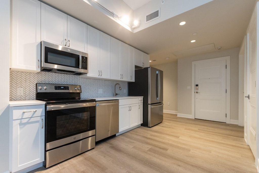 Interior, Kitchen, Recessed Lighting, Stainless Steel Appliances, Wood Texture Flooring