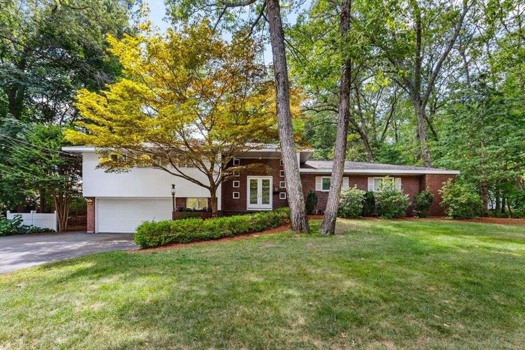 Attached, Backyard, Exterior, Facade, Brick Facade, Raised Ranch