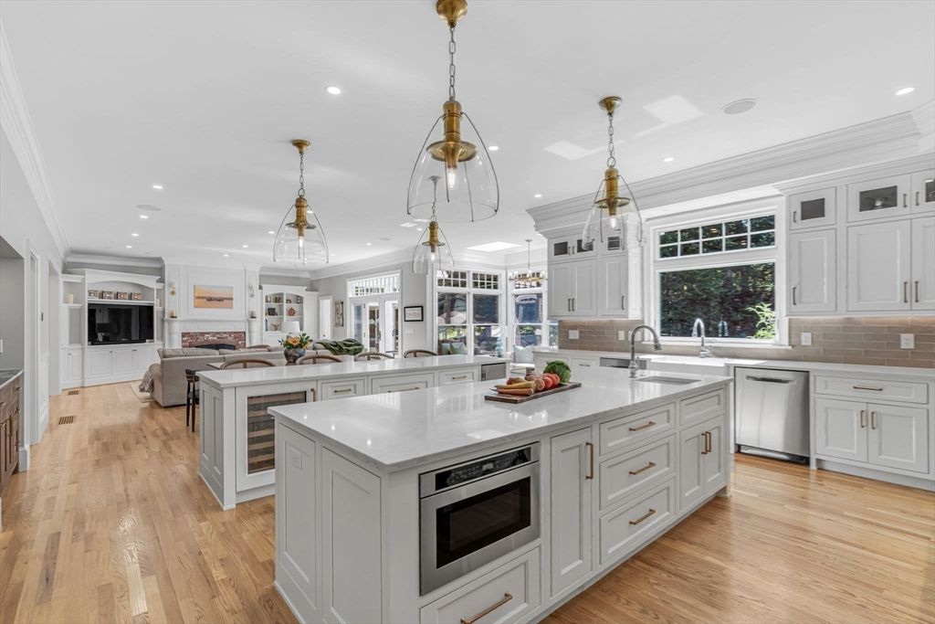 Fireplace, Interior, Kitchen, Pendant Lights, Recessed Lighting, Stainless Steel Appliances, Wood Texture Flooring