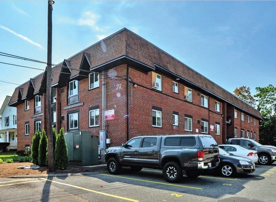 Exterior, Facade, Brick Facade, Condo Building