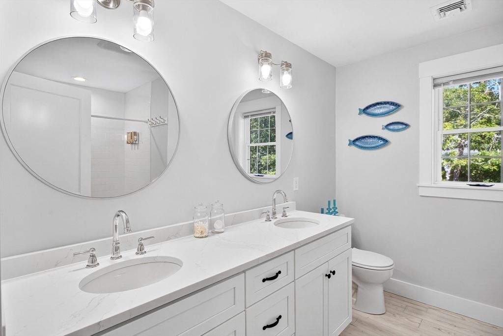 Bathroom, Dual Sink Vanities, Interior, Recessed Lighting, Wood Texture Flooring