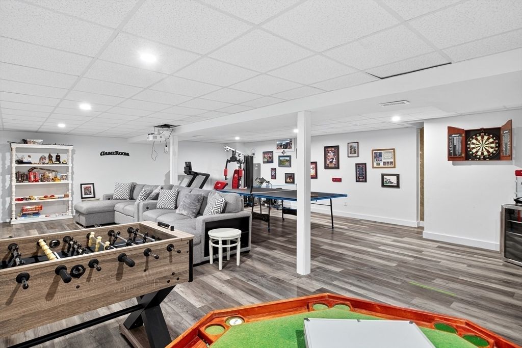Fitness Equipment, Game Room, Interior, Living room, Recessed Lighting, Wood Texture Flooring