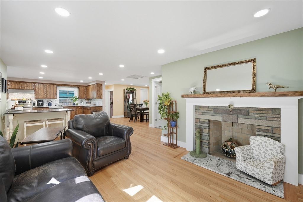 Dining room, Fireplace, Interior, Kitchen, Living room, Recessed Lighting, Wood Texture Flooring