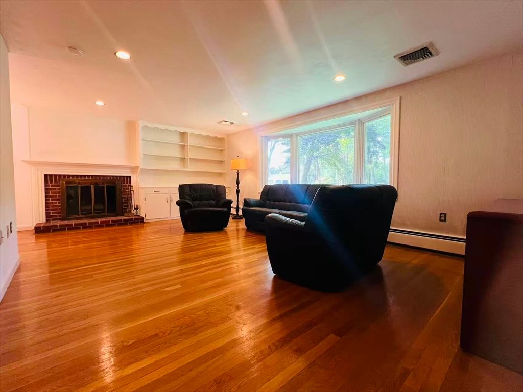 Fireplace, Interior, Living room, Recessed Lighting, Wood Texture Flooring