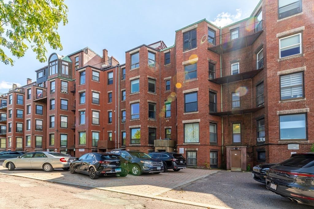 Exterior, Facade, Brick Facade, Condo Building