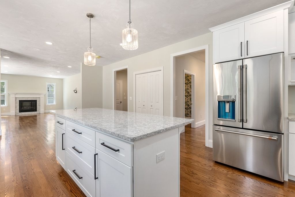 Fireplace, Interior, Kitchen, Pendant Lights, Recessed Lighting, Stainless Steel Appliances, Wood Texture Flooring