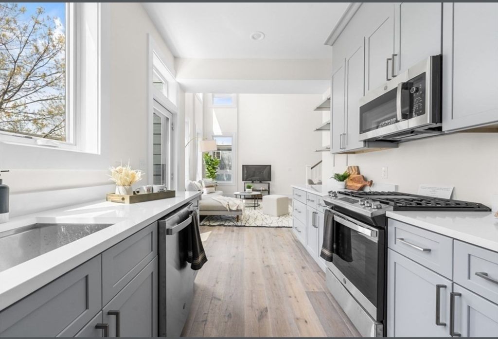 Dining room, Interior, Kitchen, Living room, Recessed Lighting, Stainless Steel Appliances, Wood Texture Flooring