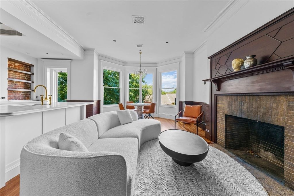 Dining room, Fireplace, Interior, Living room, Pendant Lights, Recessed Lighting, Wood Texture Flooring