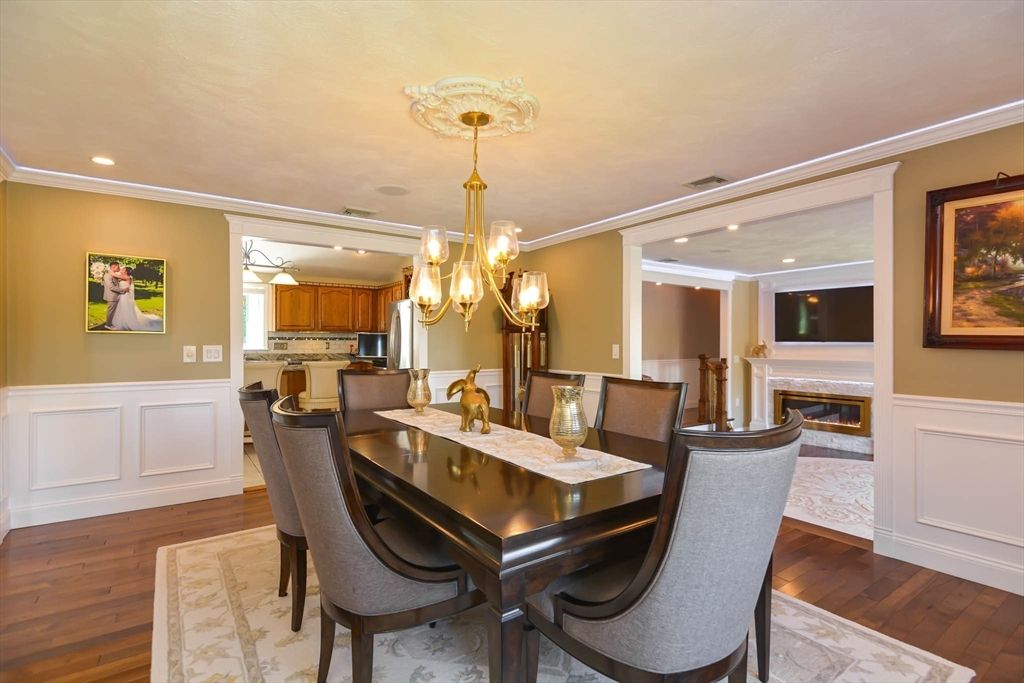 Chandelier, Dining room, Fireplace, Interior, Kitchen, Recessed Lighting, Wood Texture Flooring